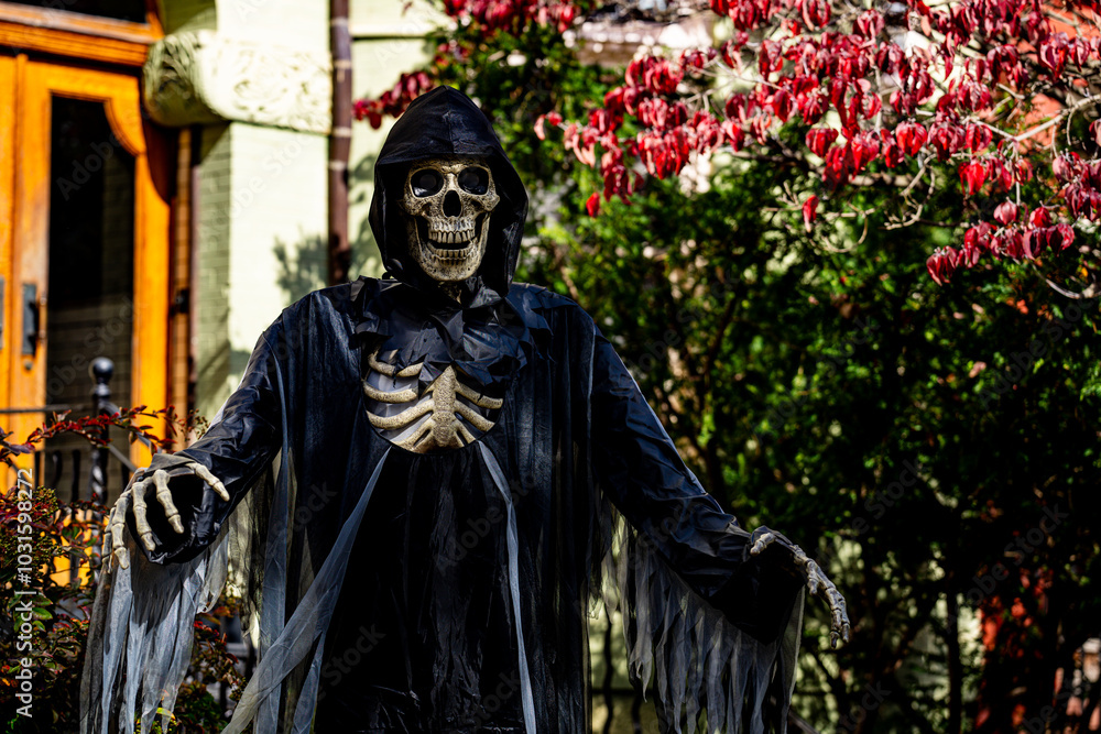 Halloween decorations. Halloween pumpkin and skeleton for decorated house. Scary Decorated at front yard of a American home. Trick or treat. Halloween background. Autumn holiday of Halloween. Halloween decorations. Halloween pumpkin and skeleton for decorated house. Scary Decorated at front yard of a American home. Trick or treat. Halloween background. Autumn holiday of Halloween.