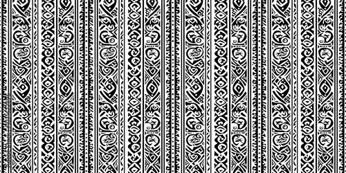 Polynesian pattern with tropical, island-themed motifs. Background seamless pattern. photo