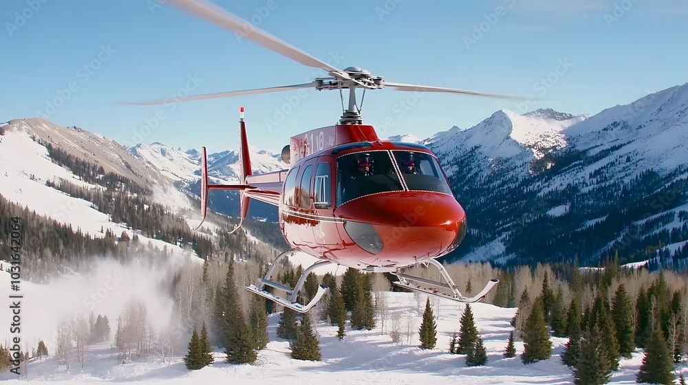 Obraz premium A bright red helicopter flies over snow-covered mountains, showcasing a clear blue sky and a winter landscape.