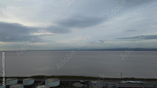 High Angle View of Sea Port and Docks at Industrial Estate of Avonmouth Bristol City of England United Kingdom During Cloudy Evening of October 15th, 2024. Aerial Drone's Camera Footage Captured from  photo