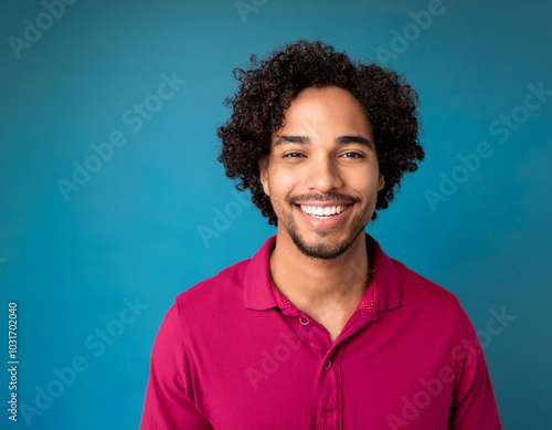 Headshot Portrait of a Smiling Man with Contemporary Style, Isolated on Color Background with Ample Copy Space