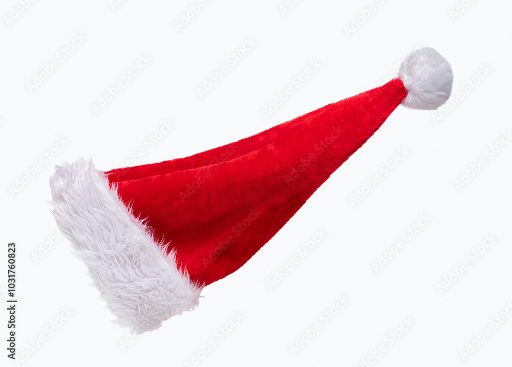 Close-up of red Santa hat with running or wind effect isolated on white background Close-up of red Santa hat with running or wind effect isolated on white background