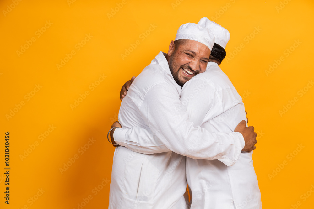 Happy Indian Muslim Men Hug each other celebrating Eid Happy Indian Muslim Men Hug each other celebrating Eid