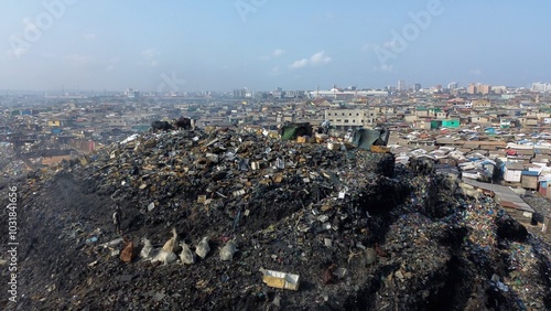 Ghana, Accra,   AGBOGBLOSHIE drone view Odaw River the largest landfill illegal dump in Africa for electronic and plastic waste from the Western world. mountain of toxic waste, environmental disaster 