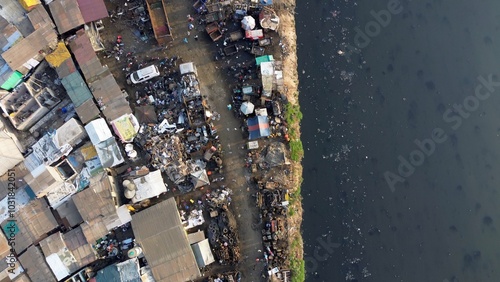 Ghana, Accra,   AGBOGBLOSHIE drone view Odaw River the largest landfill illegal dump in Africa for electronic and plastic waste from the Western world. mountain of toxic waste, environmental disaster 