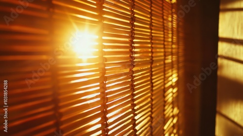 A detailed shot of light pouring through the gaps in wooden blinds, illuminating a room.