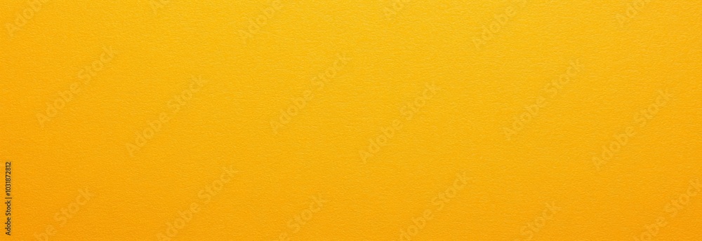 Fototapeta premium Bright yellow plain paper texture with a smooth finish