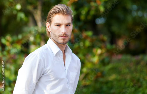 Confident young man in outdoor setting