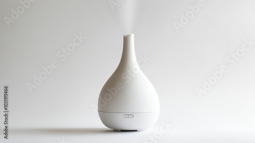 A sole aroma oil diffuser stands isolated against a pristine white backdrop. 