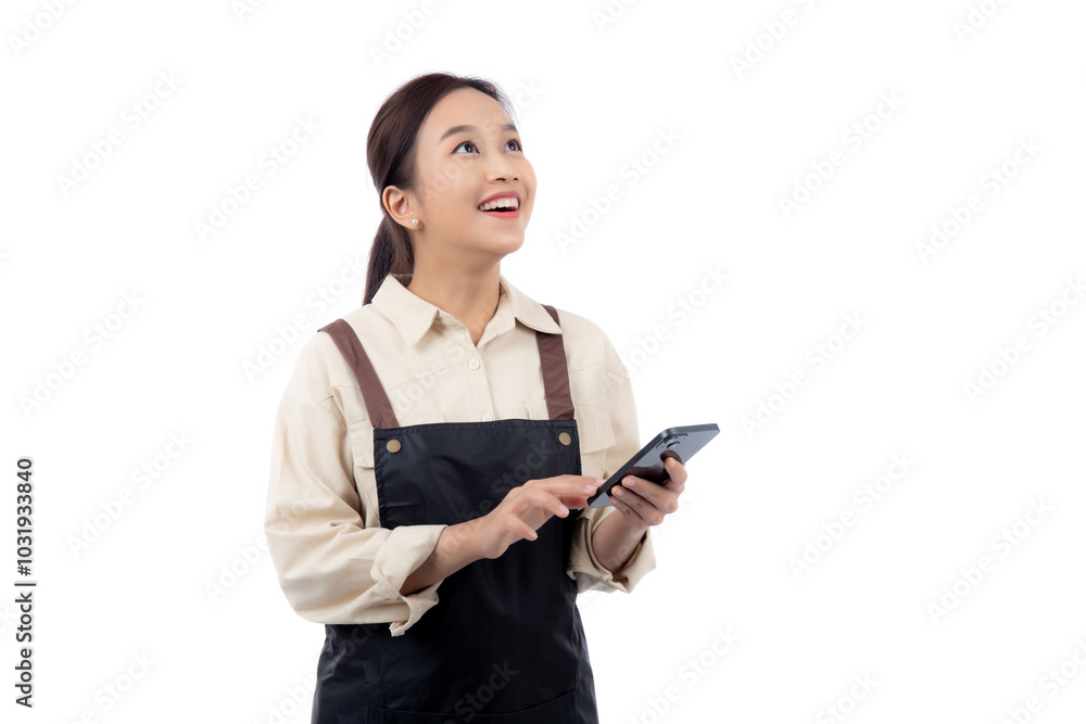Portrait happy young asian barista woman in apron smiling while looking smart phone isolated white background, waitress or entrepreneur watching smartphone, small business or startup, waiter of cafe. Portrait happy young asian barista woman in apron smiling while looking smart phone isolated white background, waitress or entrepreneur watching smartphone, small business or startup, waiter of cafe.