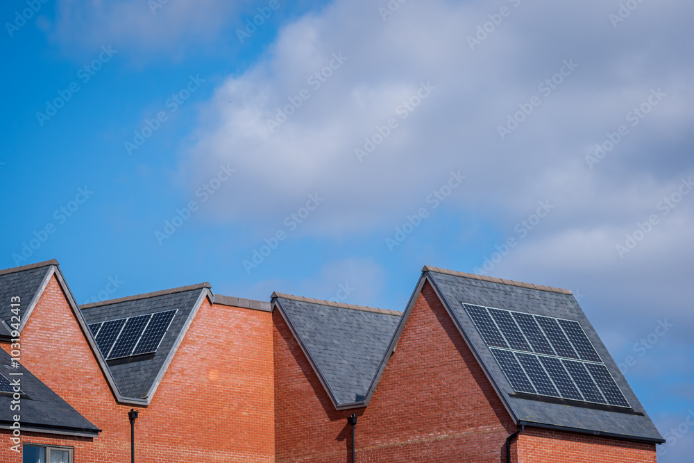 Solar energy panel on new built house roof in england uk Solar energy panel on new built house roof in england uk