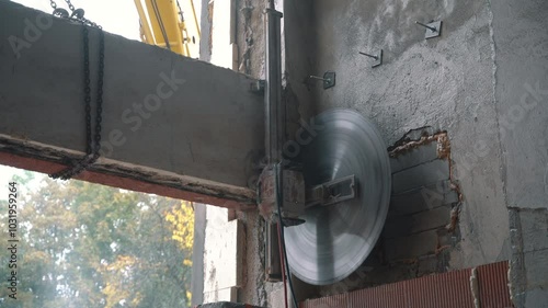 Cutting Concrete Wall Panel with Wall Saw. Construction and Demolition Work