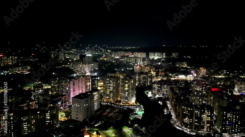 Night drone view of India city, Aerial view of Mumbai Pune City, Maharashtra, India. Drone shot of Mumbai skyline, Mumbai's cityscape and skyline, beautiful modern buildings 4K
