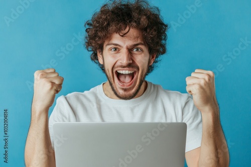 Excited italian man holding laptop pc computer doing winner gesture clench fist isolated on blue background, Generative AI