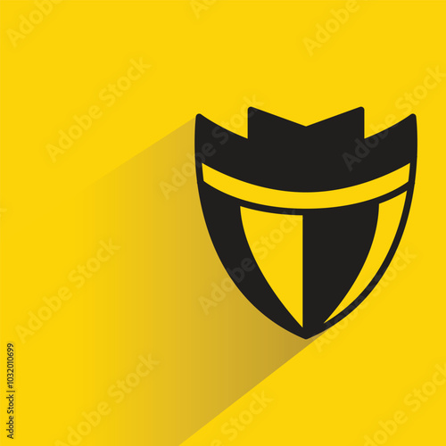 shield badge with shadow on yellow background