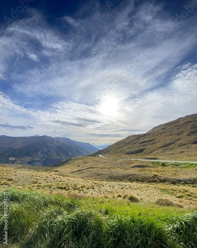 Scenic views at the Crown Range Summit Lookout . Landscape with mountains and clouds