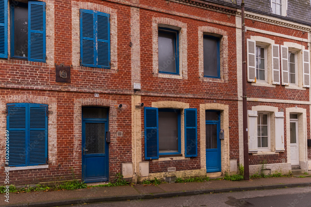 old brick building with windows old brick building with windows