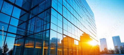 Modern Glass Building Exterior with Blue Sky and Sunset. Corporate Building, Office Building.