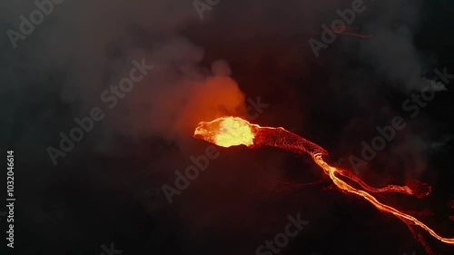 Close-up view of erupting volcano in Iceland with explosions of hot lava photo