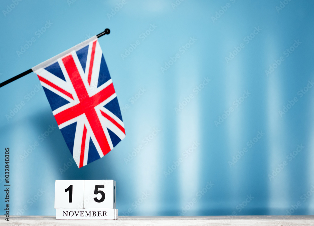 Fototapeta premium November Calendar With British Flag With Number 15. Calendar cubes with numbers. Copy space.