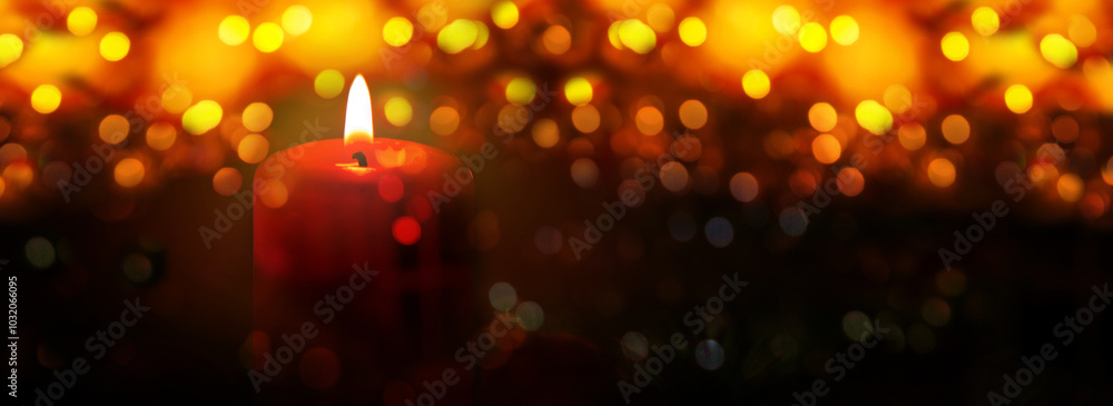 Glowing Advent candle on colorful bokeh background . Glowing Advent candle on colorful bokeh background .