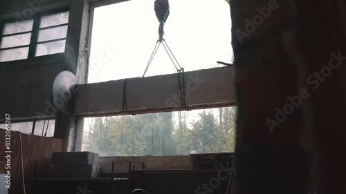 Cutting Concrete Wall Panel with Wall Saw. Construction and Demolition Work