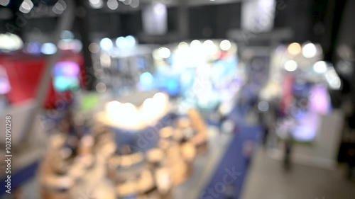 Wallpaper Mural Intentionally blurred footage of people visiting pavilions and booths during a business trade fair  Torontodigital.ca