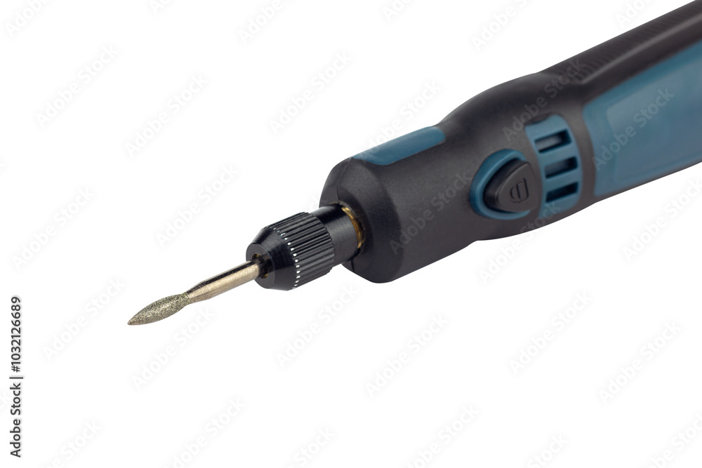 hand engraver with cutter for hand engraver and drill with diamond filings, mini hand drill on battery isolated from background hand engraver with cutter for hand engraver and drill with diamond filings, mini hand drill on battery isolated from background