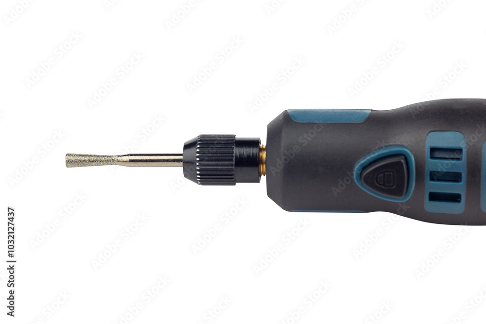 hand engraver with cutter for hand engraver and drill with diamond filings, mini hand drill on battery isolated from background hand engraver with cutter for hand engraver and drill with diamond filings, mini hand drill on battery isolated from background