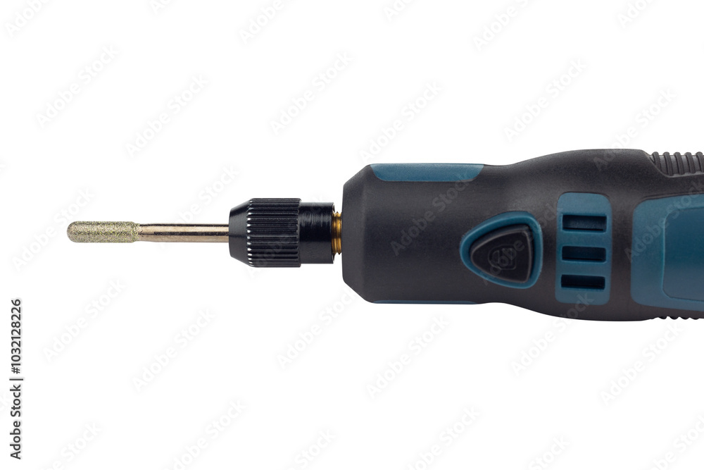 hand engraver with cutter for hand engraver and drill with diamond filings, mini hand drill on battery isolated from background hand engraver with cutter for hand engraver and drill with diamond filings, mini hand drill on battery isolated from background