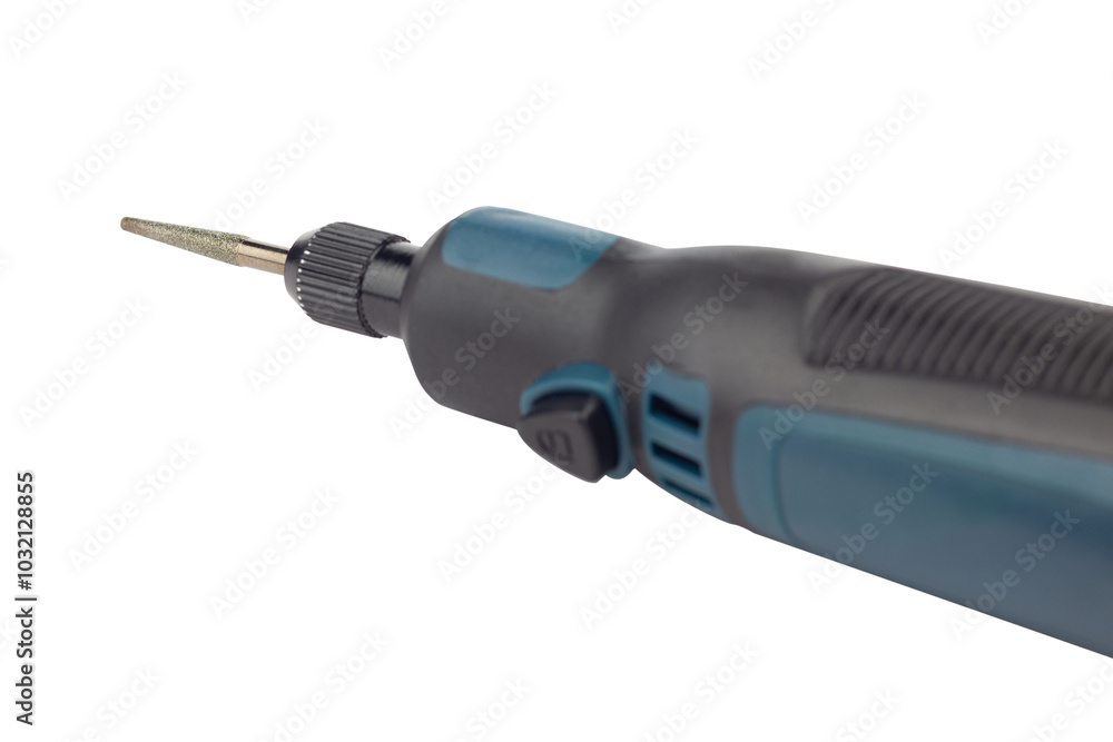hand engraver with cutter for hand engraver and drill with diamond filings, mini hand drill on battery isolated from background hand engraver with cutter for hand engraver and drill with diamond filings, mini hand drill on battery isolated from background
