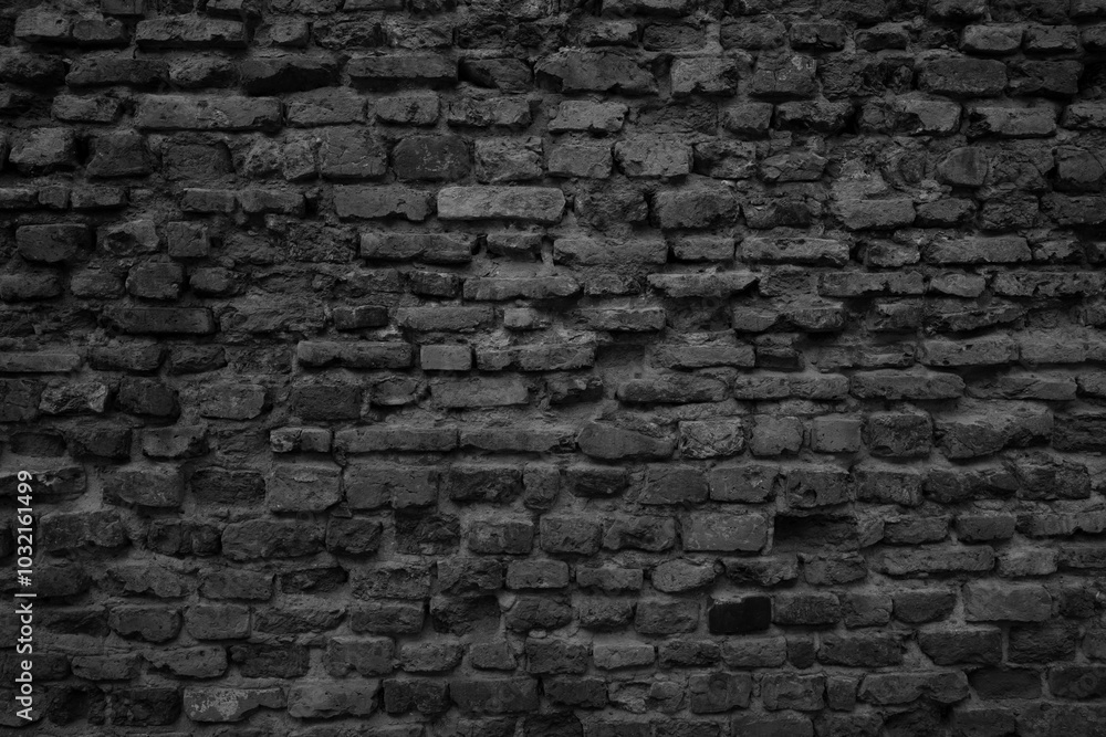 Old black brick wall tetxure. Grunge background Old black brick wall tetxure. Grunge background