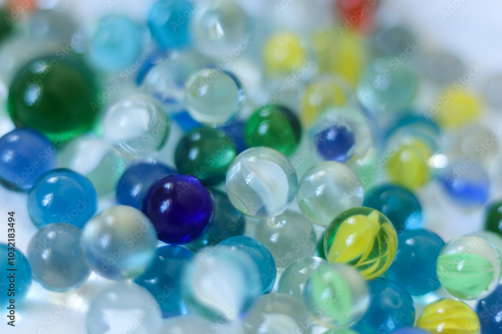 Colorful marbles close-up macro photography. Selective focus. Colorful marbles close-up macro photography. Selective focus.