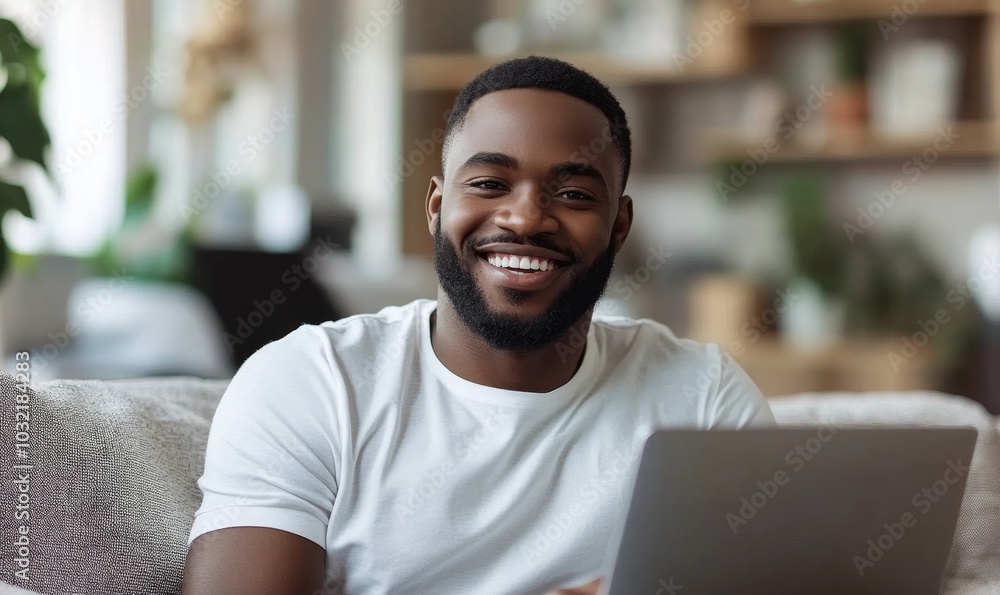 Smiling black man using computer working or studying while sitting on sofa at home. Free copy space, Generative AI Smiling black man using computer working or studying while sitting on sofa at home. Free copy space, Generative AI