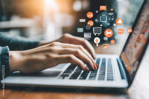 Wallpaper Mural Hands Typing on Laptop Keyboard with Digital Marketing Icons Displayed on Screen, Showcasing Online Advertising, SEO Optimization, and Data Analytics for Business Growth. Torontodigital.ca