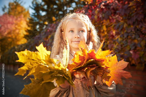 joyful girl with leaves