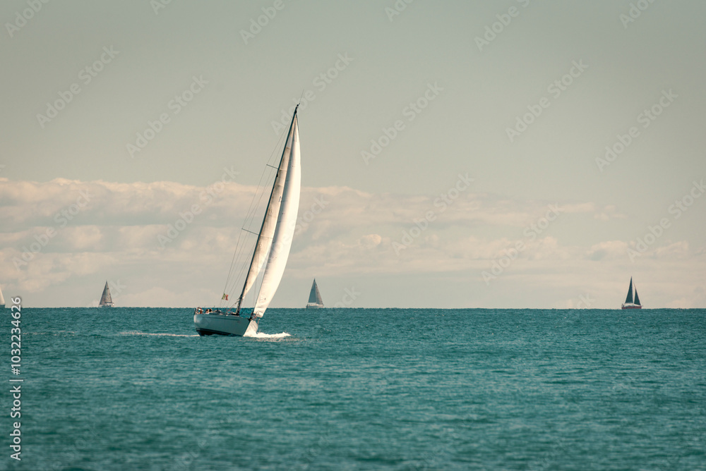 Fototapeta premium Sailboats in a calm sea.
