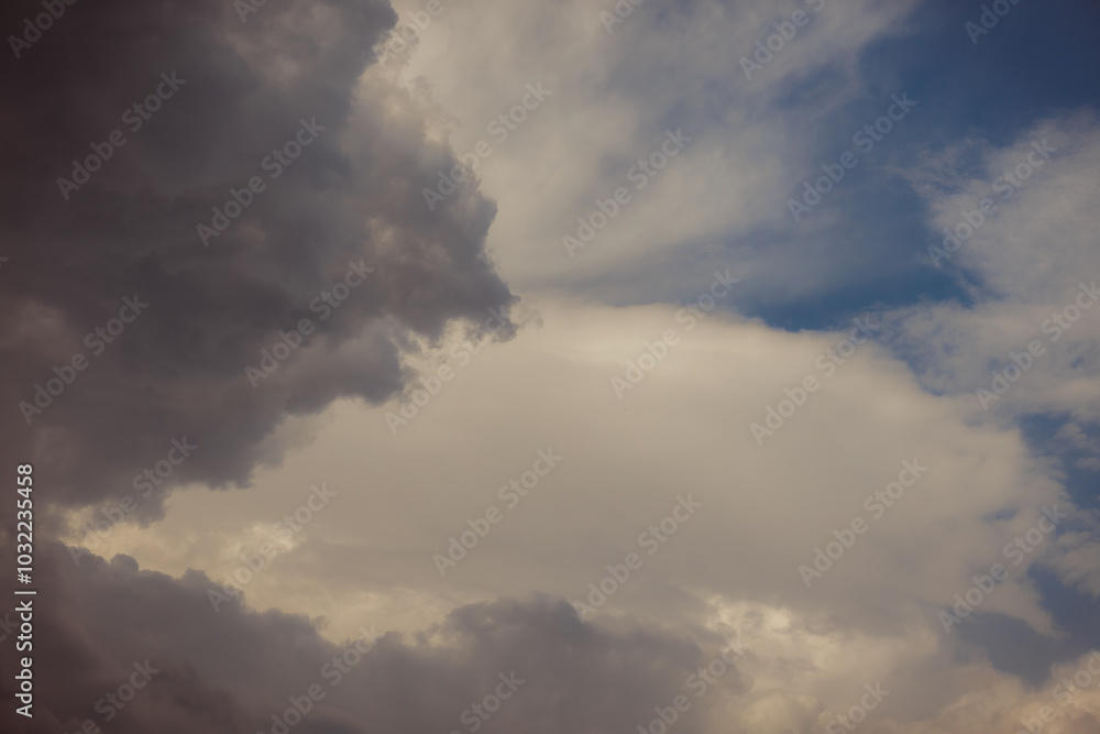 White heap clouds in the blue peaceful sky. The concept of psychological calmness and health. Peace of mind with the forces of nature. Air travel concept. White heap clouds in the blue peaceful sky. The concept of psychological calmness and health. Peace of mind with the forces of nature. Air travel concept.