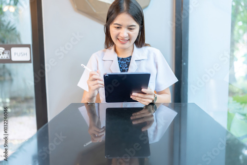 With a keen interest in research, the Asian female doctor in the hospital was actively involved in studies aimed at improving techniques for treating disease and enhancing the field of medicine.