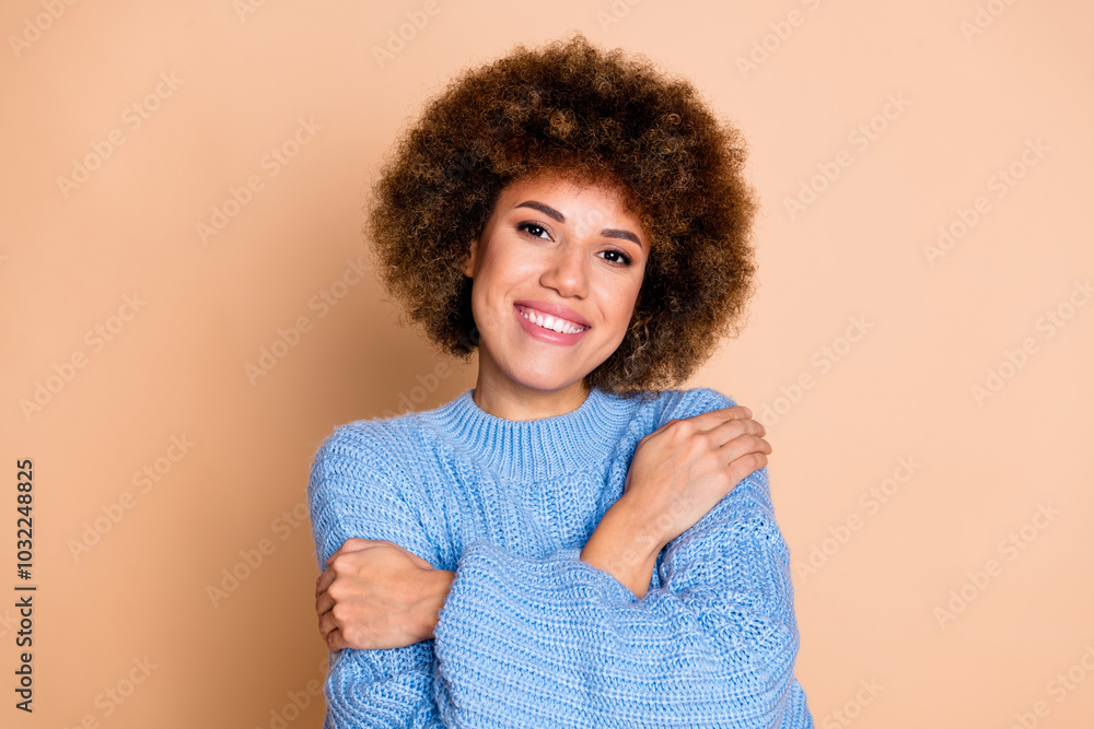 Photo of lovely adorable girl with perming coiffure dressed blue sweater cuddle warm knit pullover isolated on pastel color background Photo of lovely adorable girl with perming coiffure dressed blue sweater cuddle warm knit pullover isolated on pastel color background