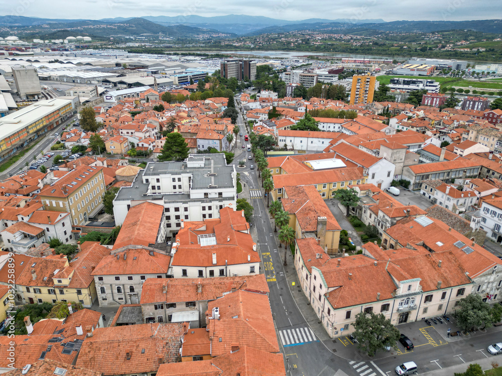 view of downtown koper slovenia (red roof buildings) scenic adriatic coast town streets square city center coastline europe european mediterranean sea mountains balkans venetian view of downtown koper slovenia (red roof buildings) scenic adriatic coast town streets square city center coastline europe european mediterranean sea mountains balkans venetian
