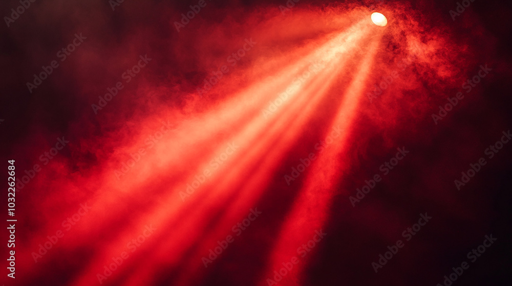 Intense red spotlight cutting through darkness mystery Intense red spotlight cutting through darkness mystery