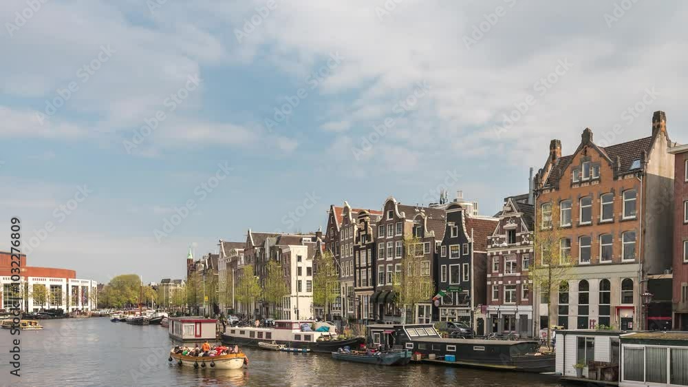 Amsterdam Netherlands time lapse, city skyline at canal waterfront Amsterdam Netherlands time lapse, city skyline at canal waterfront