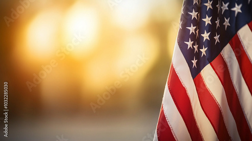 Close-up of the American flag billowing in the wind with vibrant red, white, and blue colors, set against a golden sunset, evoking a sense of national pride and celebration.