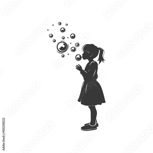 Silhouette of a young girl blowing bubbles