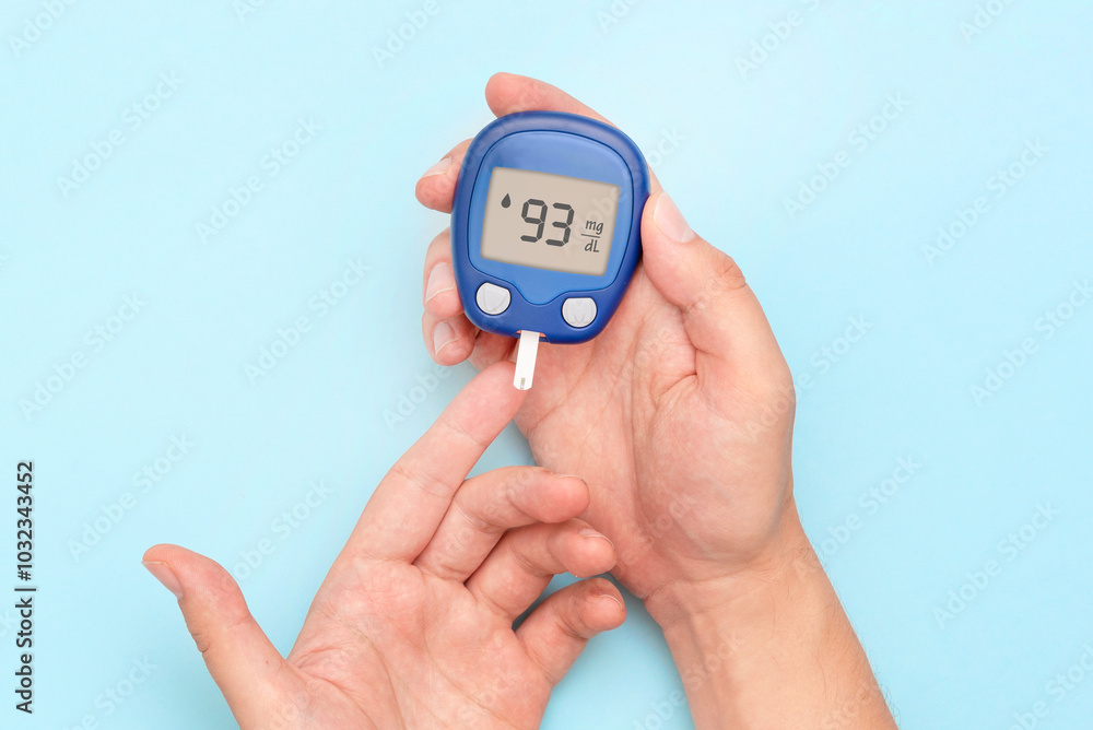 Person checking blood sugar level with glucometer Person checking blood sugar level with glucometer
