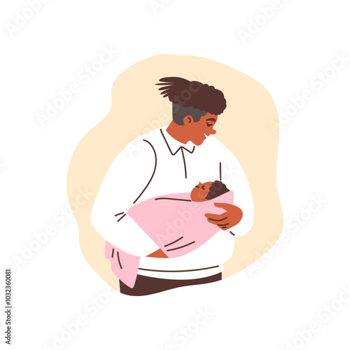 Father holds a baby wrapped in a blanket.