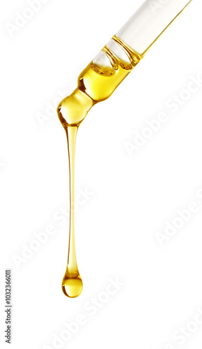 Obraz na płótnie Essential oil dripping from pipette on white background