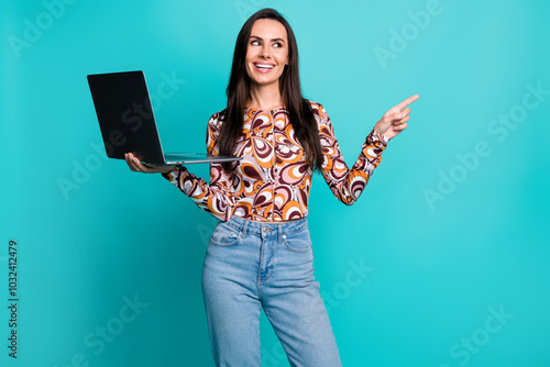 Photo of cheerful pretty lady dressed retro shirt texting modern gadget showing empty space isolated blue color background