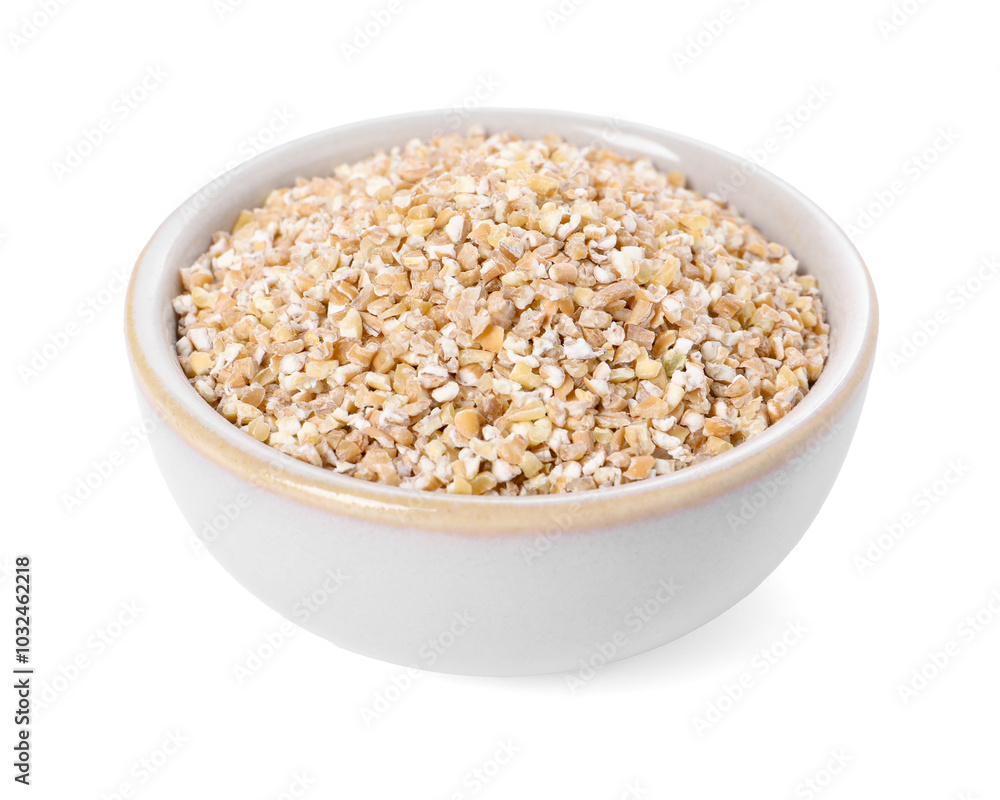 Dry wheat groats in bowl isolated on white Dry wheat groats in bowl isolated on white